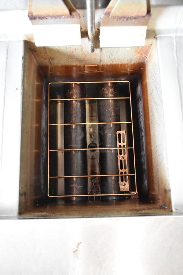 2020 Henny Penny OGA-323 ENERGY STAR Stainless Steel Commercial Natural Gas Powered 3 Bay Fryer w/ 3 Metal Fry Baskets on Commercial Casters. 255,000 BTU.  - Image 6 of 12