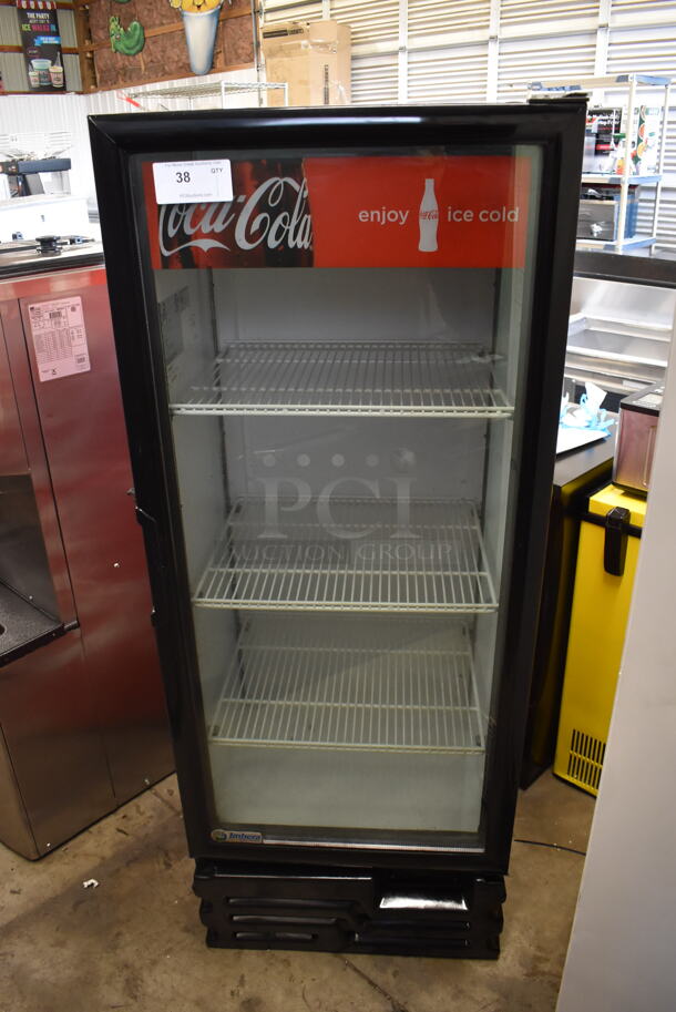 Imbera VR12 Commercial Single Door Merchandiser Cooler With Black Trim And Polycoated Shelves. 115V, 1 Phase. Tested and Powers On But Does Not Get Cold