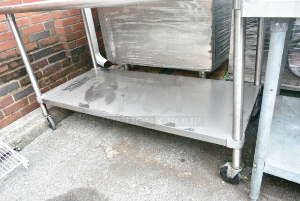 Stainless Steel Table w/ Metal Under Shelf, Drawer and Back Splash on Commercial Casters.  - Image 3 of 4