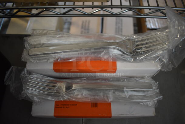 4 Boxes of 12 BRAND NEW! Metal Forks. 8.5