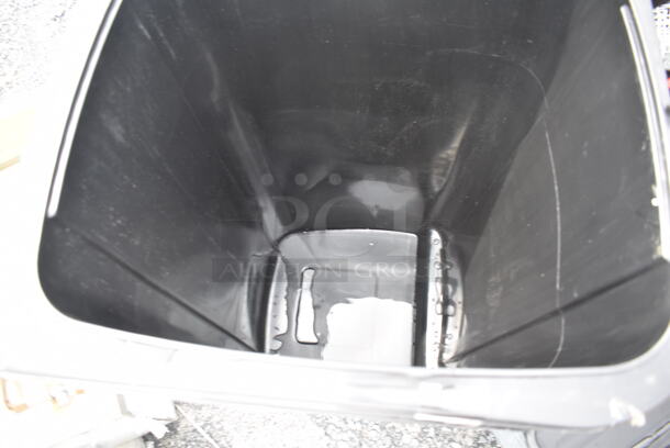 2 BRAND NEW SCRATCH AND DENT! Lavex 475TCWCN50BK 50 Gallon Black Wheeled Rectangular Trash Can. No Lids. 2 Times Your Bid!  - Image 4 of 5