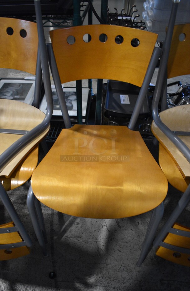 4 Wooden Dining Chairs on Gray Metal Frame. Stock Picture - Cosmetic Condition May Vary. 17x16x31. 4 Times Your Bid!