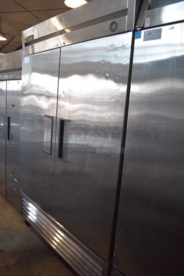 2013 True T-49F ENERGY STAR Stainless Steel Commercial 2 Door Reach In Freezer w/ Poly Coated Racks on Commercial Casters. 115 Volts, 1 Phase. Tested and Working!