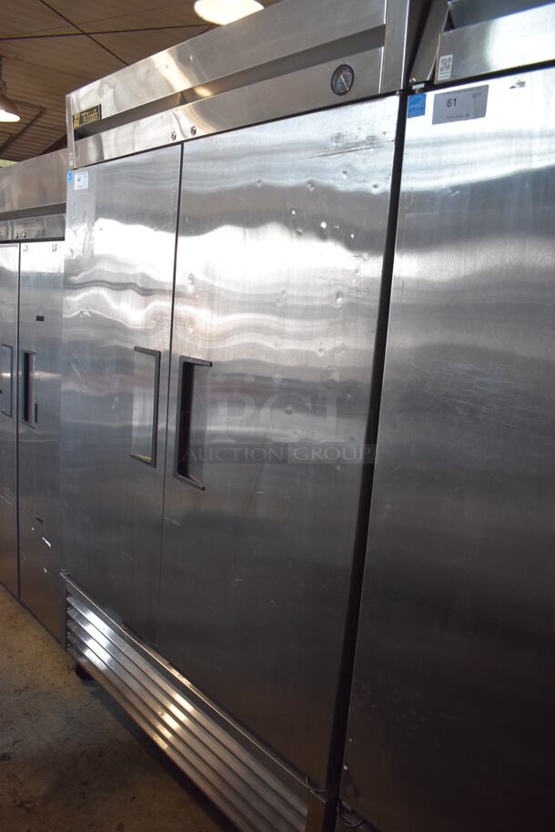 2013 True T-49F ENERGY STAR Stainless Steel Commercial 2 Door Reach In Freezer w/ Poly Coated Racks on Commercial Casters. 115 Volts, 1 Phase. Tested and Working! - Image 1 of 6
