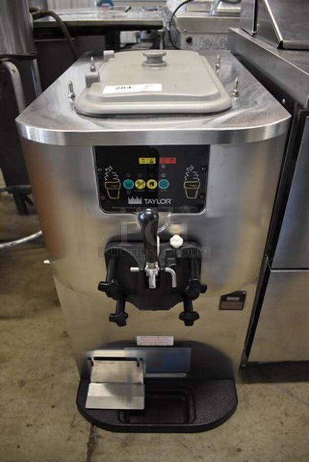 Taylor C707-27 Stainless Steel Commercial Countertop Air Cooled Single Flavor Soft Serve Ice Cream Machine. 208-230 Volts, 1 Phase. 18x34x34