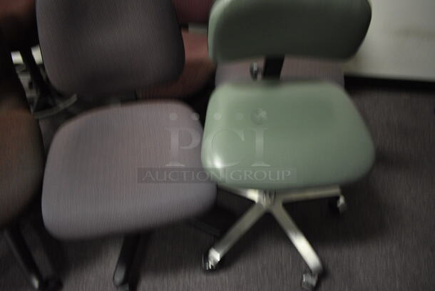  6 office chairs in a variety of colors.  6 Times Your Bid! (Main Building) - Image 4 of 6