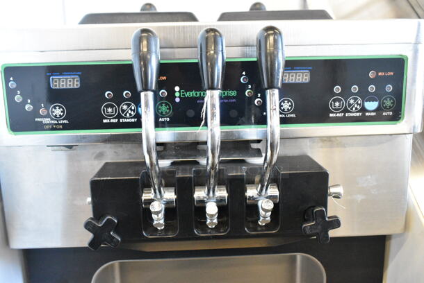 Wellspring Model SSI-143S Stainless Steel Commercial Floor Style Air Cooled 2 Flavor w/ Twist Soft Serve Ice Cream Machine on Commercial Casters. 220 Volts, 1 Phase.  - Image 2 of 7