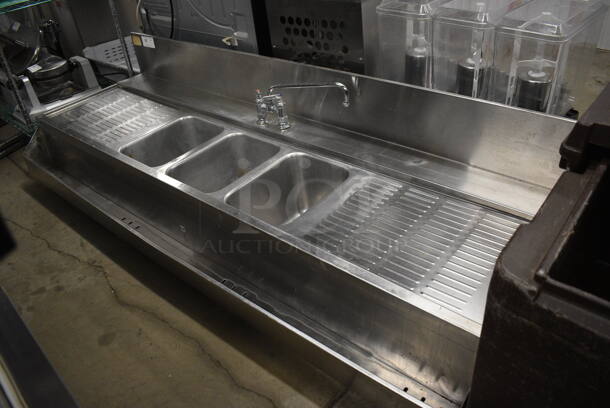 Stainless Steel Commercial 3 Bay Sink w/ Dual Drainboards, Speed Well, Faucet, Handles and Back Splash. Does Not Have Legs. 83x29x21. Bays 10x14x10. Drainboards 21x16x1
