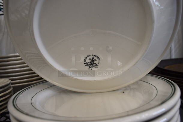 18 White Ceramic Plates w/ Green Lines on Rim. 9.5x9.5x1. 18 Times Your Bid! - Image 3 of 3