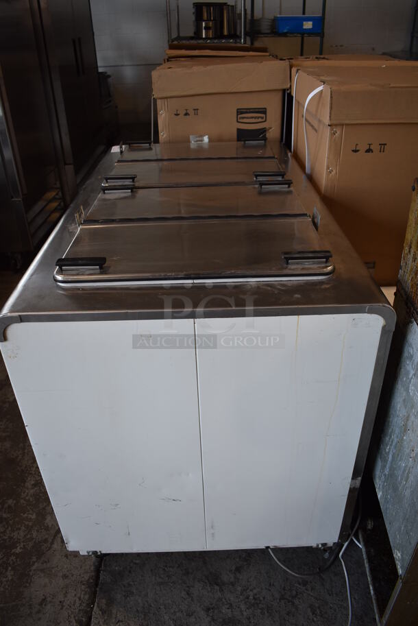 Metal Commercial Chest Freezer w/ 2 Center Hinge Lids on Commercial Casters. 54x31x38. Tested and Powers On But Does Not Get Cold - Image 6 of 7