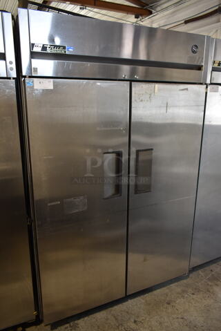 2012 True TG2R-2S ENERGY STAR Stainless Steel Commercial 2 Door Reach In Cooler w/ Poly Coated Racks on Commercial Casters. 115 Volts, 1 Phase. Tested and Working!