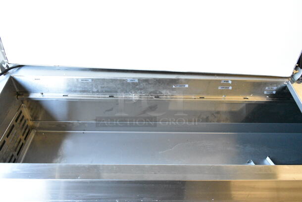 BRAND NEW SCRATCH AND DENT! 2024 Avantco 178APPT91HC Stainless Steel Commercial 3 Door Refrigerated Pizza Prep Table. 115 Volts, 1 Phase. Tested and Working! - Image 6 of 9