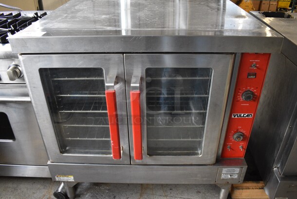 Vulcan Stainless Steel Commercial Electric Powered Full Size Convection Oven w/ View Through Doors, Metal Oven Racks and Thermostatic Controls on Commercial Casters. 208-240 Volts, 1 Phase. 40x31x40
