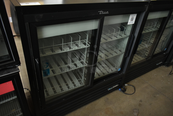 2024 True GDM-41SL-48-HC-LD Metal Commercial 2 Door Reach In Cooler Merchandiser w/ Poly Coated Racks. 115 Volts, 1 Phase. Tested and Working!