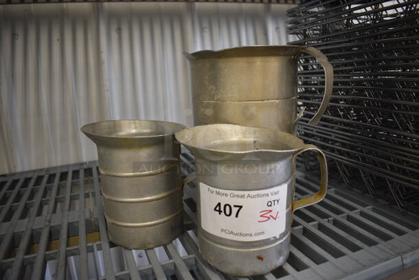 3 Various Metal Pitchers. Includes 6.5x5x5. 3 Times Your Bid! - Image 1 of 3