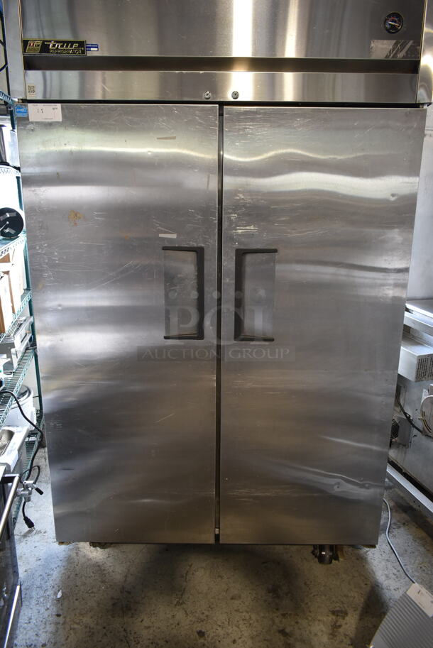 2012 True TG2R-2S ENERGY STAR Stainless Steel Commercial 2 Door Reach In Cooler w/ Poly Coated Racks on Commercial Casters. 115 Volts, 1 Phase. Tested and Working! - Image 4 of 9
