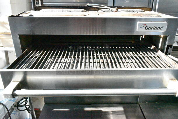 Garland M44T Stainless Steel Commercial Natural Gas Powered Flat Top w/ Oven, Salamander Cheese Melter and Back Splash on Commercial Casters. - Image 4 of 12