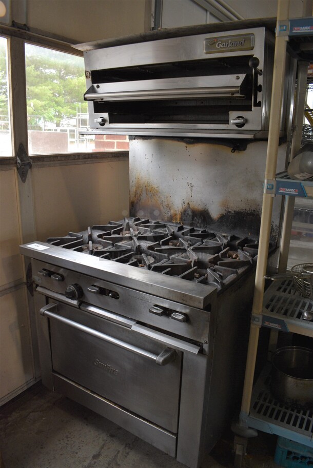 Garland SunFire Stainless Steel Commercial Natural Gas Powered 6 Burner Range w/ Oven, Salamander Cheese Melter and Backsplash. 36x34x70 - Image 1 of 5