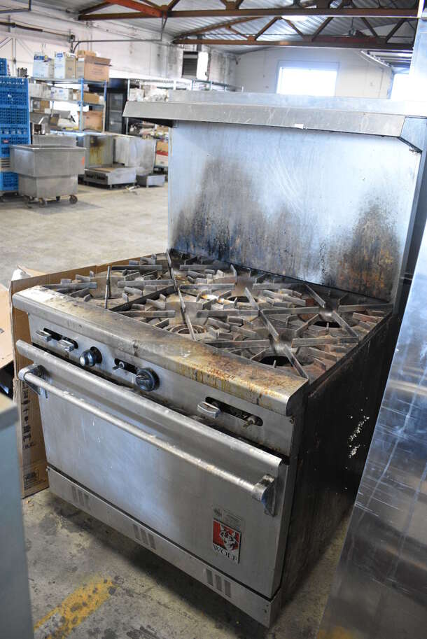 Wolf Stainless Steel Commercial Natural Gas Powered 6 Burner Range w/ Oven, Over Shelf and Back Splash. 36x31x60 - Image 3 of 6