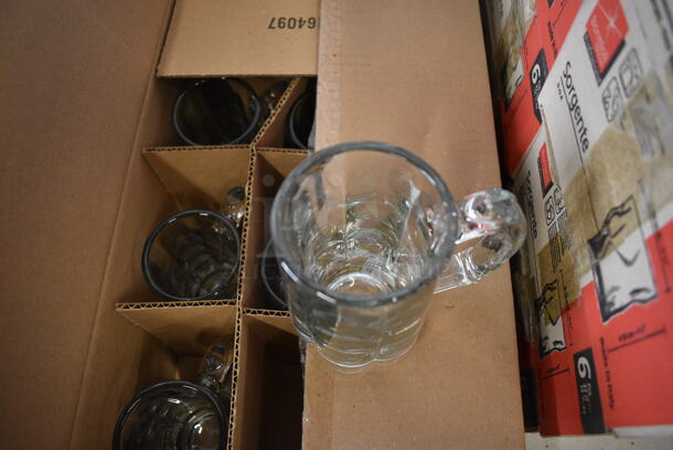 12 BRAND NEW IN BOX! Glass Mugs. 5x3x5.5. 12 Times Your Bid! - Image 3 of 4