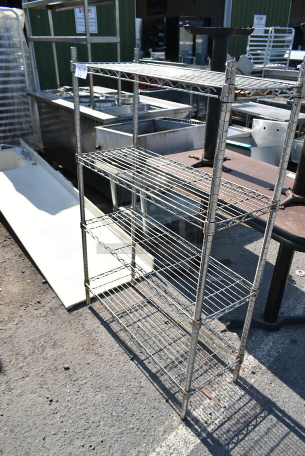 Chrome Finish 4 Tier Wire Shelving Unit. BUYER MUST DISMANTLE. PCI CANNOT DISMANTLE FOR SHIPPING. PLEASE CONSIDER FREIGHT CHARGES.  - Image 1 of 4