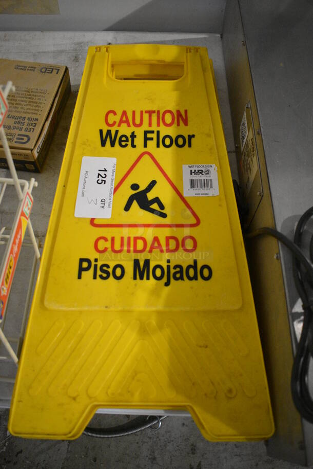 3 Yellow Poly Wet Floor Caution Signs. 12x1x25. 3 Times Your Bid! - Image 1 of 3