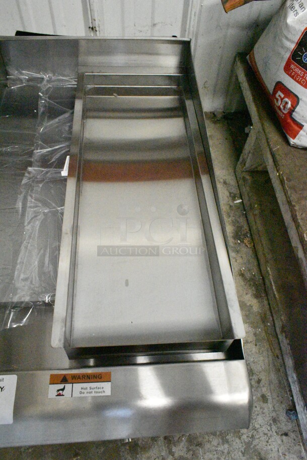 BRAND NEW SCRATCH AND DENT! 2023 Cooking Performance Group CPG 351GTCPG15NL 15" Natural Gas Countertop Griddle with Flame Failure Protection and Thermostatic Controls. 30,000 BTU  - Image 5 of 10