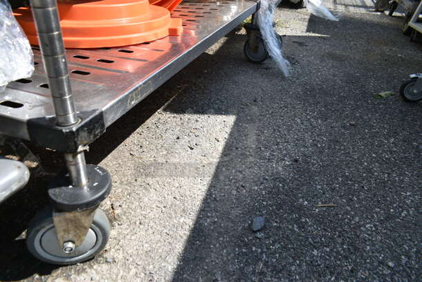 Chrome Finish 4 Tier Shelving Unit w/ Contents Including Fire Extinguisher, Wet Floor Caution Sign, Salad Spinner. BUYER MUST DISMANTLE. PCI CANNOT DISMANTLE FOR SHIPPING. PLEASE CONSIDER FREIGHT CHARGES. We Will Not Ship The Fire Extinguisher.  - Image 3 of 12