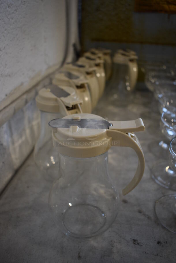 10 Glass Syrup Pourers. 4.5x3.5x6. 10 Times Your Bid! - Image 1 of 3