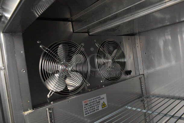 BRAND NEW SCRATCH AND DENT! 2023 Avantco 178SSPPT3 Stainless Steel Commercial Pizza Prep Table on Commercial Casters. 115 Volts, 1 Phase. Tested and Working! - Image 7 of 11