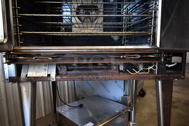 Imperial ICVG-1 Stainless Steel Commercial Natural Gas Powered Full Size Convection Oven w/ View Through Door, Solid Door, Metal Oven Racks, Thermostatic Controls and Metal Legs on Commercial Casters. - Image 11 of 12