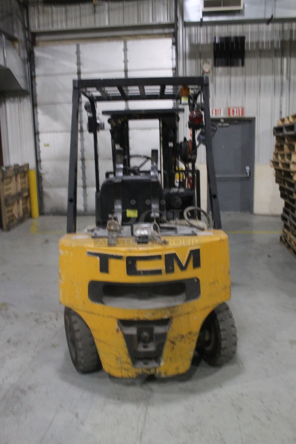 TCM FG20 Metal Commercial Propane Gas Powered Riding Forklift. Hours Read 1,550. BUYER MUST REMOVE: This Item CANNOT Be Transported; Must Pick Up By Appointment Only Approximately 1 Week After Auction Ends; Forklift Will Be Used During Pick Up Day. - Image 2 of 12