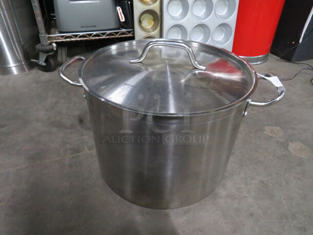 One 24 Quart Stainless Steel Stock Pot With Lid. #SST-24. 