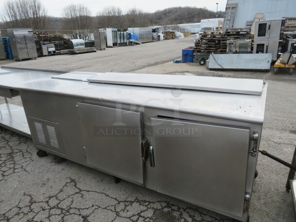 One 2 Door Refrigerated Prep Table On Casters. 90.5X34X37. Working