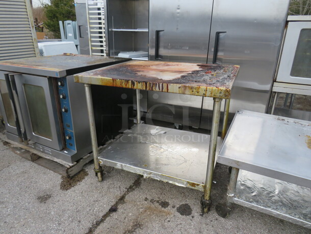 One Stainless Steel Table With Under Shelf On Casters. 40X34X36 - Image 1 of 1