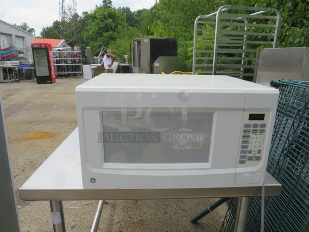 One GE Microwave. 22X16X12 - Image 1 of 1