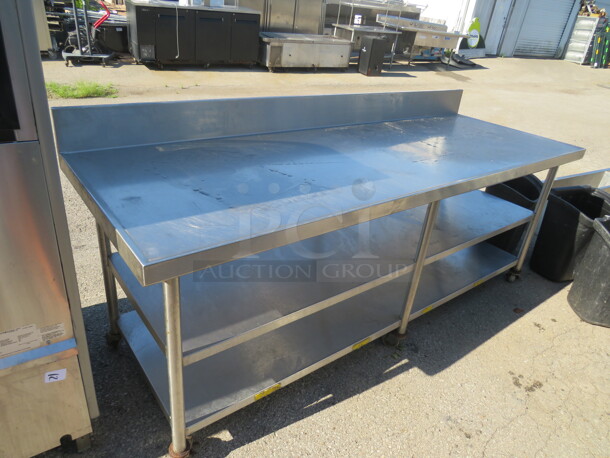 One Stainless Steel Table With 2 Stainless Steel Under Shelves With Back Splash, On Casters. 90X32X39.5 - Image 2 of 2