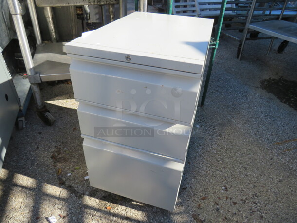 One 3 Drawer Metal File Cabinet On Casters. 15X23X27