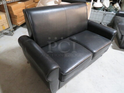 One Black Pleather Couch. Small Rip See Pic. 60X31X35