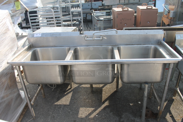 Commercial Stainless Steel Flushmount  3 Bay Sink With Faucet On Galvanized Legs. - Image 1 of 8