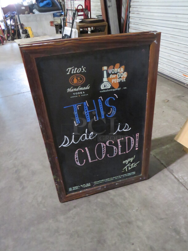 One Wooden Framed Titos Sidewalk Chalkboard Sign. 24X36 - Image 1 of 2