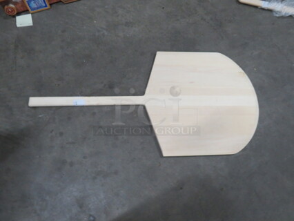 One NEW Wooden Pizza Paddle.