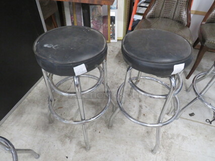 Double Chrome Ring Bar Stool With A Black Cushioned Swivel Seat. Need To Be Recovered. 2XBID