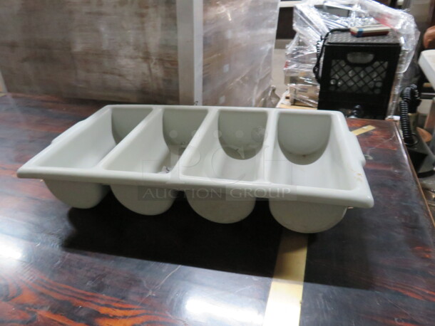 One 4 Hole Poly Flatware Holder.