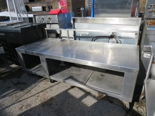 One Stainless Steel Equipment Cabinet With Back Bar, Stainless Under Shelves On Casters. 72.5X30.5X32