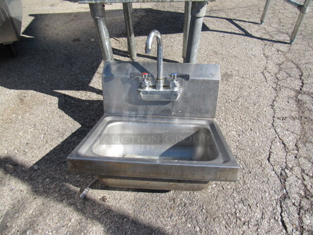 One 17X15 Stainless Steel Hand Sink With Faucet.