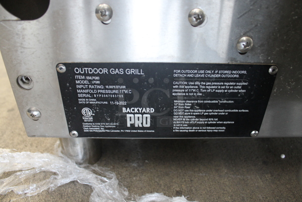 BRAND NEW SCRATCH AND DENT! 2022 Backyard Pro LPG60RD 60" Stainless Steel Liquid Propane Outdoor Grill With 2 Roll Dome Lids. Stock Picture Used as Gallery Picture. - Image 12 of 12