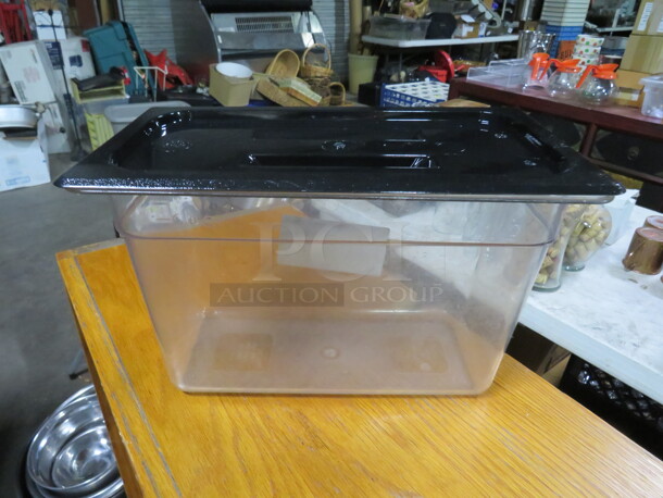 One Clear Cambro 1/3 Size 8 Inch Deep Food Storage Container With Lid. 
