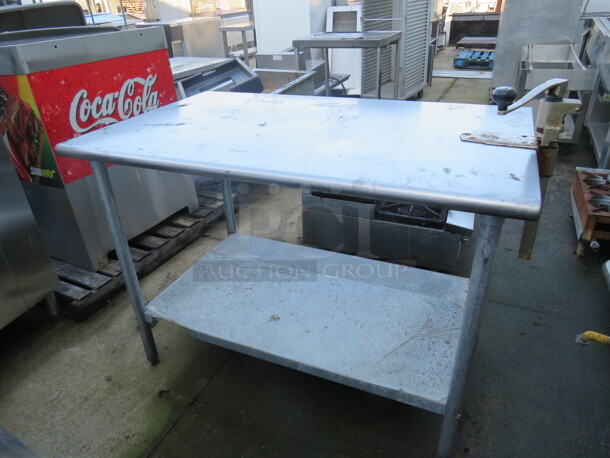 One Stainless Steel Table With Under Shelf With A 10lb Can Opener. 48X30X35