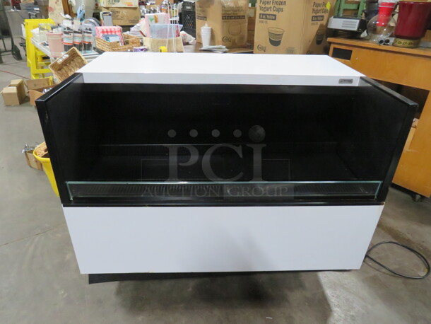 One WORKING Oasis Structural Concepts Under Counter Air Curtain Merchandiser With Manual. 47X32X34. Model# CO43R. 120 Volt. $9341.10. - Image 2 of 7